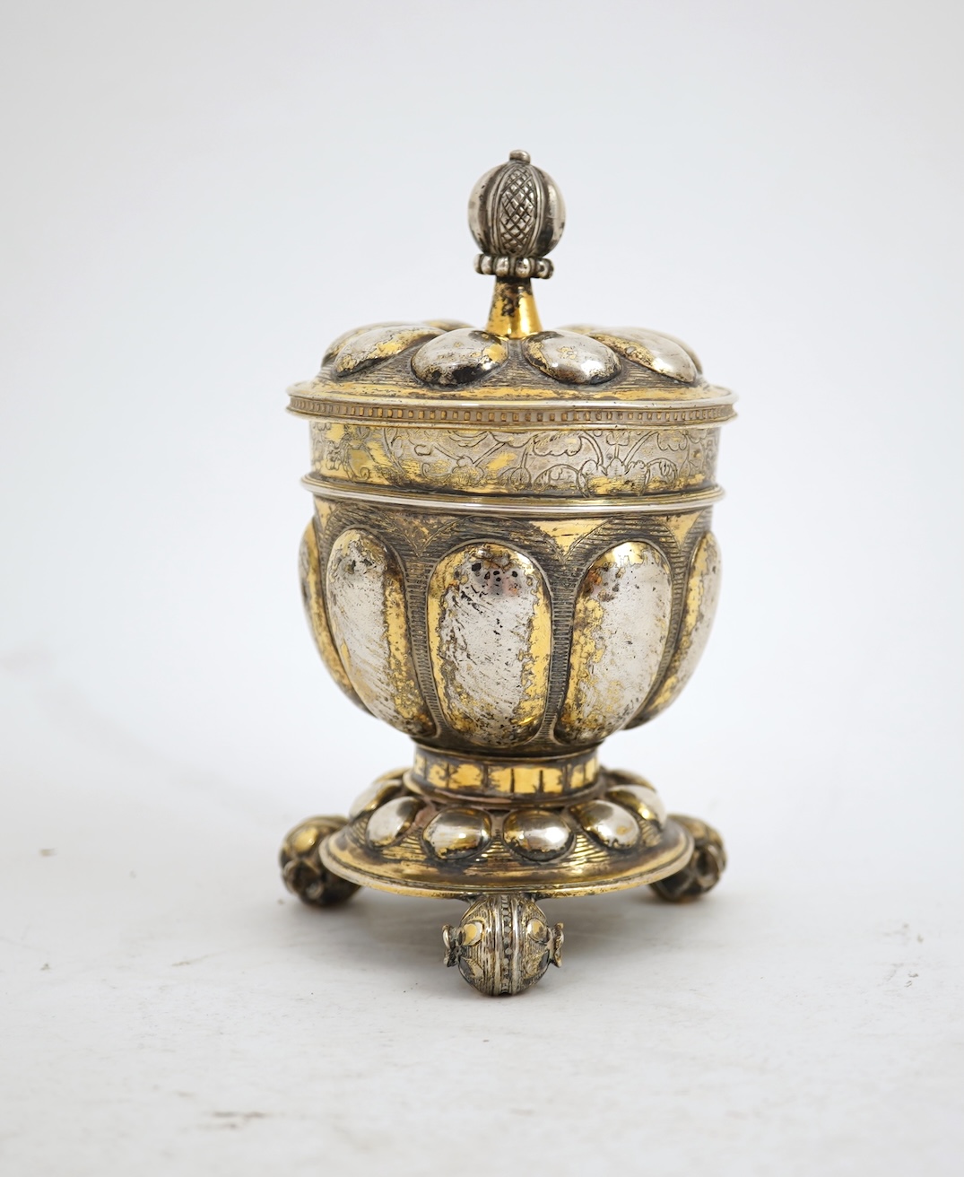 A 16th/17th century German silver gilt 'pineapple' cup and cover